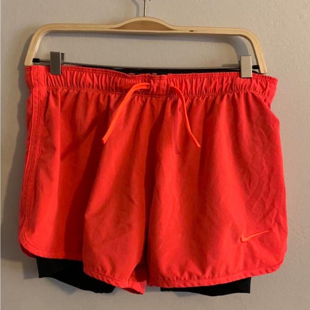 neon orange nike running shorts